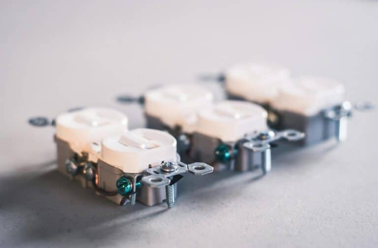 A detailed close-up of electrical outlets. Perfect for construction and electrical use themes.